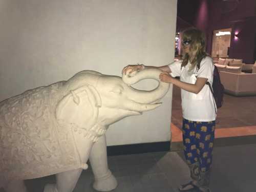 feeling elephant statue